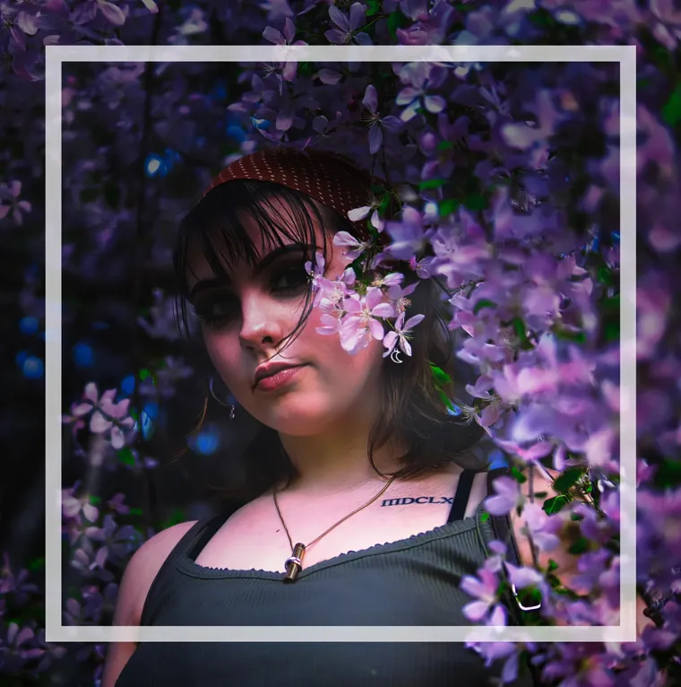 Headshots Charleston, portrait framed in purple blooms by Bryan Korth